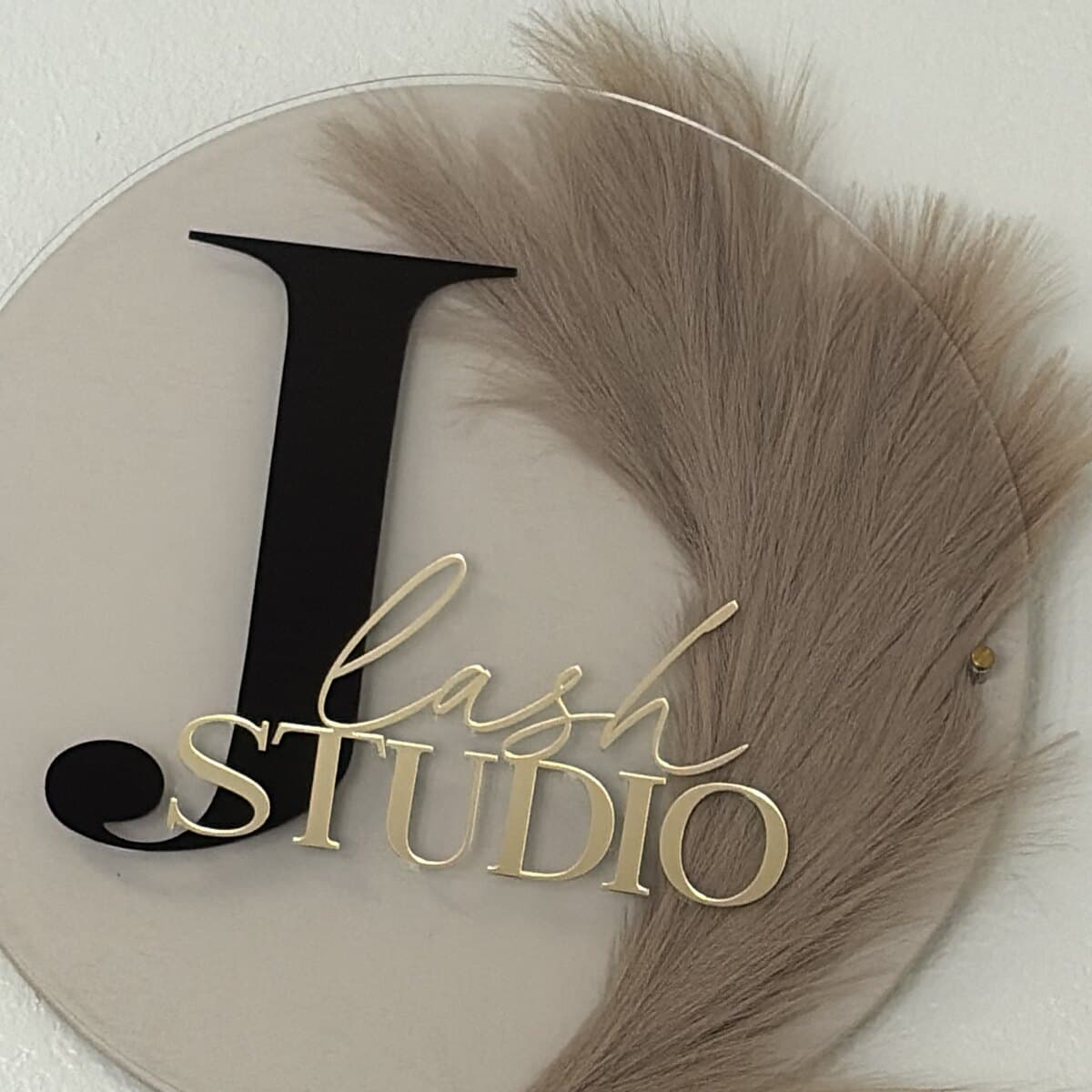 J Lash Studio signage in the studio